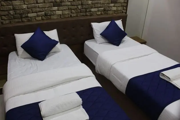Deluxe Tek Büyük veya İki Ayrı Yataklı Oda