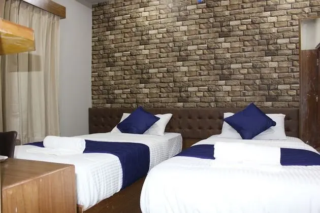 Deluxe Tek Büyük veya İki Ayrı Yataklı Oda