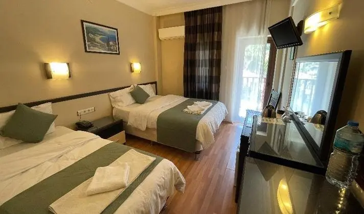 Üç Kişilik Oda