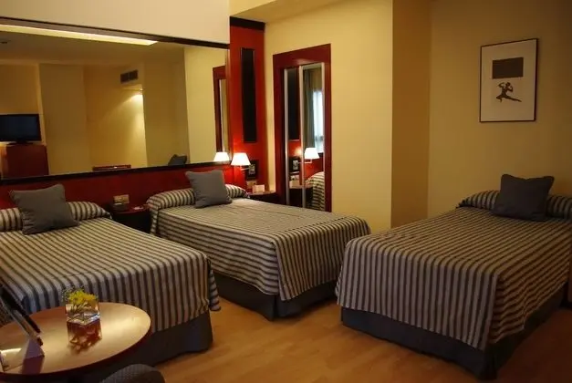 Triple Room (2 adults and 1 kid)