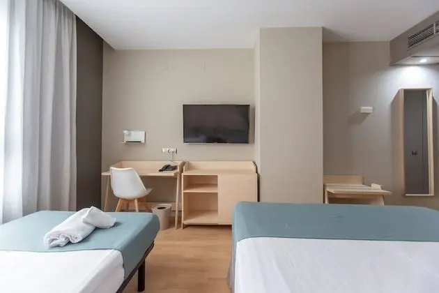 Triple Room (2 adults and 1 kid)