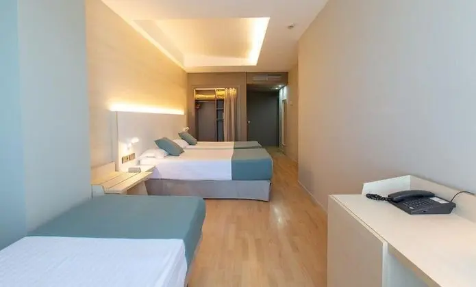 Triple Room (2 adults and 1 kid)