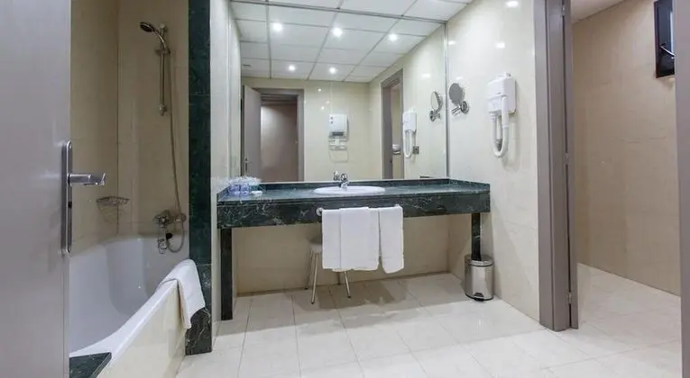 Triple Room (2 adults and 1 kid)