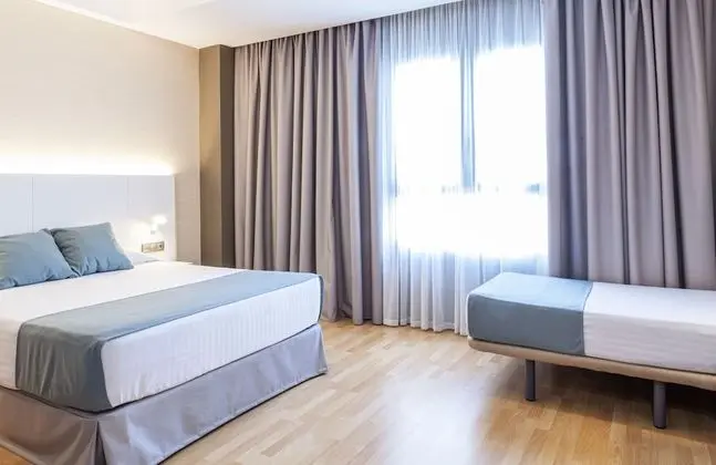 Triple Room (2 adults and 1 kid)