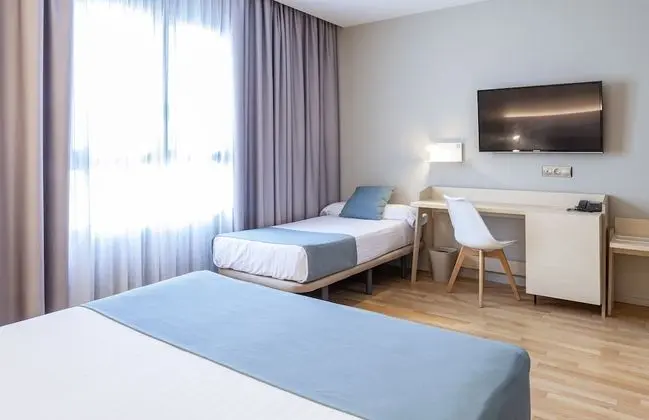 Triple Room (2 adults and 1 kid)