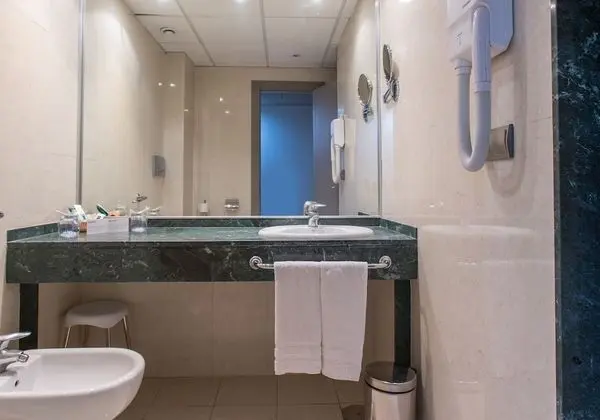 Triple Room (2 adults and 1 kid)