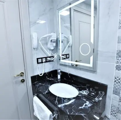 Deluxe Tek Büyük veya İki Ayrı Yataklı Oda