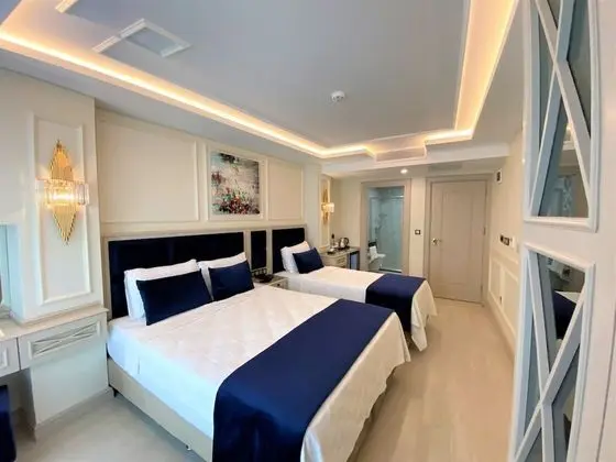 Deluxe Üç Kişilik Oda