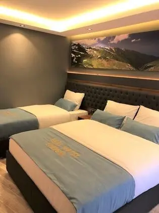 Deluxe Üç Kişilik Oda, Birden Çok Yatak