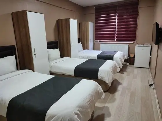 Üç Kişilik Oda