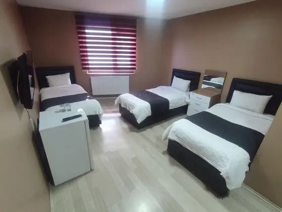 Üç Kişilik Oda