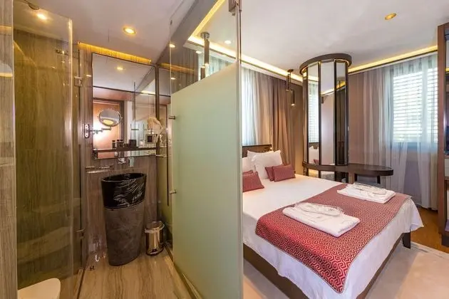 Deluxe Tek Büyük veya İki Ayrı Yataklı Oda
