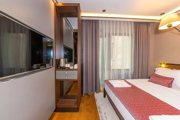Deluxe Tek Büyük veya İki Ayrı Yataklı Oda