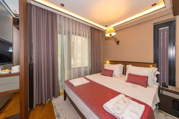 Deluxe Tek Büyük veya İki Ayrı Yataklı Oda