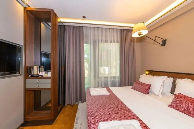 Deluxe Tek Büyük veya İki Ayrı Yataklı Oda