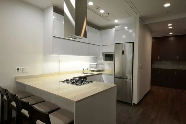 1-Bedroom Apartment with Kitchen: Extra person (over 6-year-old) will be charged upon check-in