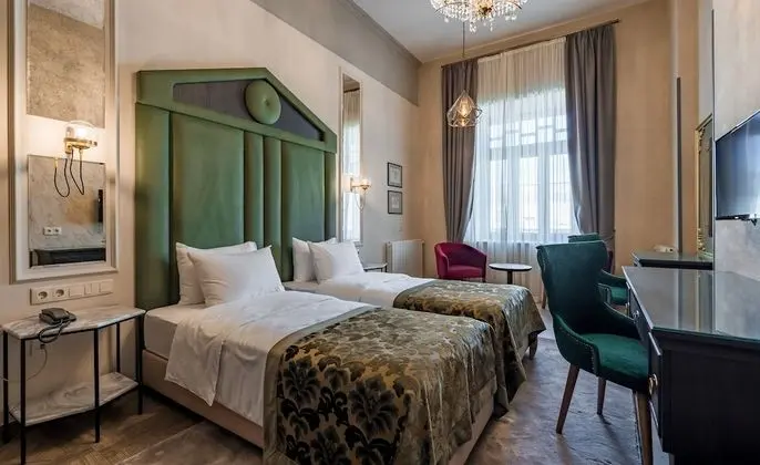 Deluxe Tek Büyük veya İki Ayrı Yataklı Oda