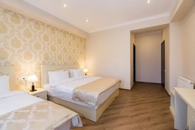 Deluxe Üç Kişilik Oda