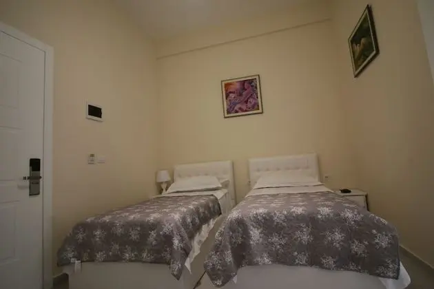 Economy Üç Kişilik Oda