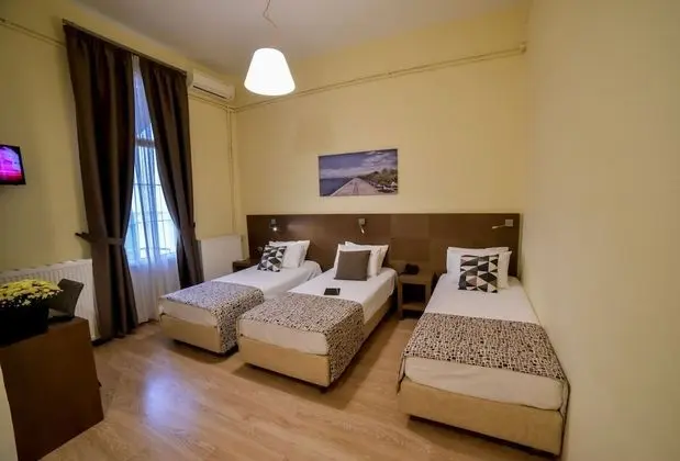 Üç Kişilik Oda