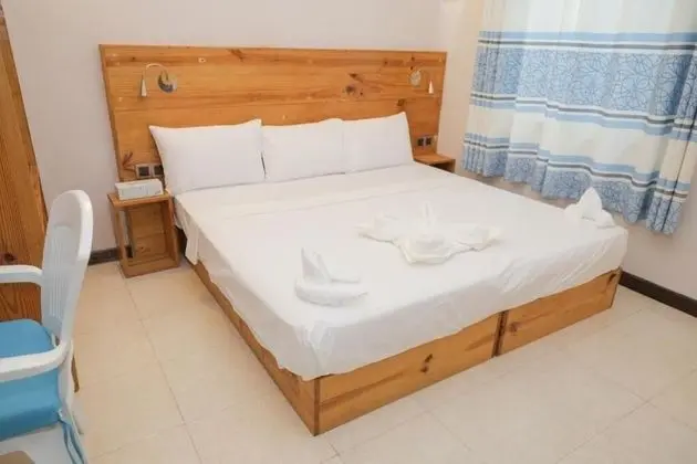 Deluxe Tek Büyük veya İki Ayrı Yataklı Oda