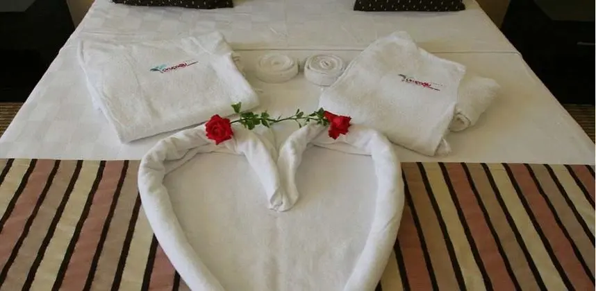 Köşe Suit