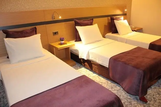 Deluxe Üç Kişilik Oda
