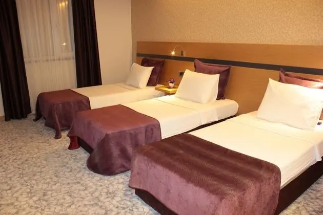 Deluxe Üç Kişilik Oda