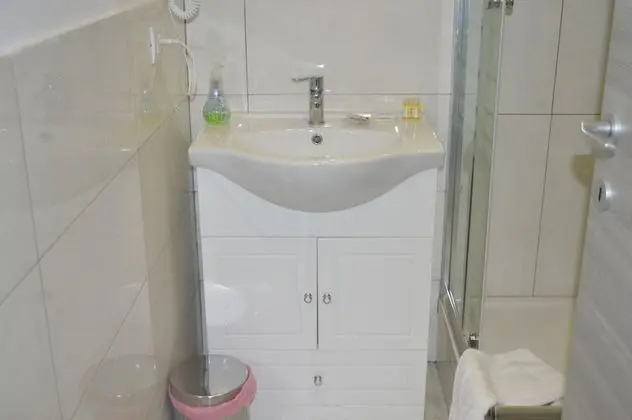 Üç Kişilik Oda