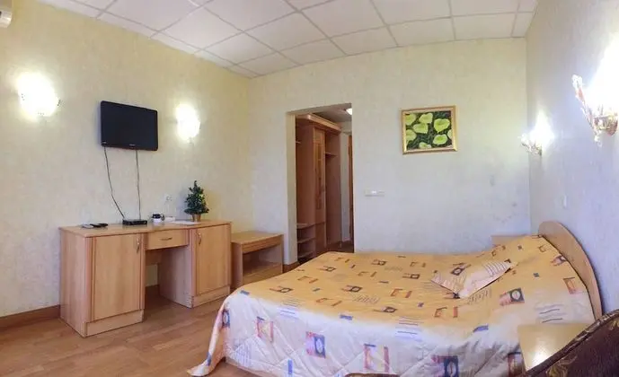 Deluxe Tek Büyük veya İki Ayrı Yataklı Oda