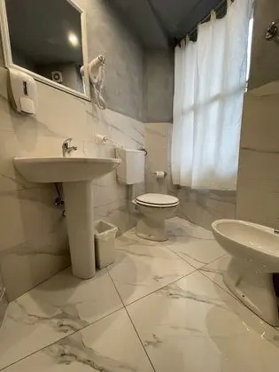 Basic Tek Büyük veya İki Ayrı Yataklı Oda