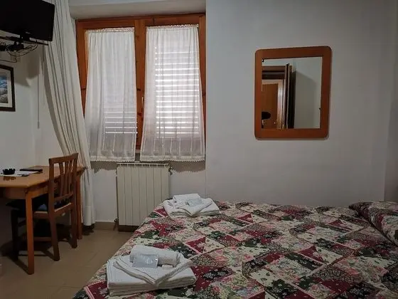 Economy Tek Büyük veya İki Ayrı Yataklı Oda