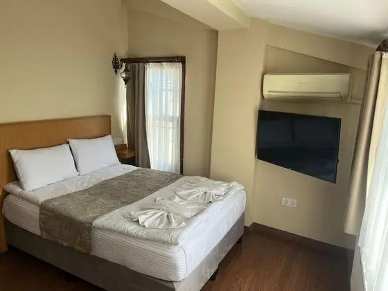 Deluxe Üç Kişilik Oda