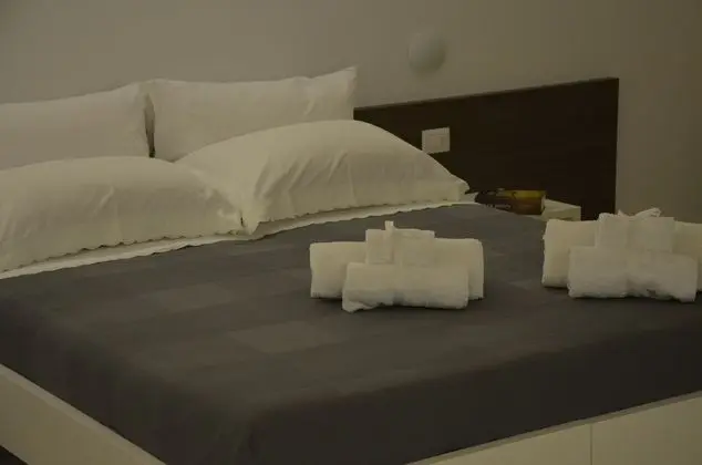 Deluxe Tek Büyük veya İki Ayrı Yataklı Oda (Barisano)