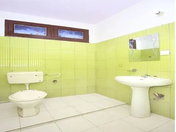 Deluxe Tek Büyük veya İki Ayrı Yataklı Oda