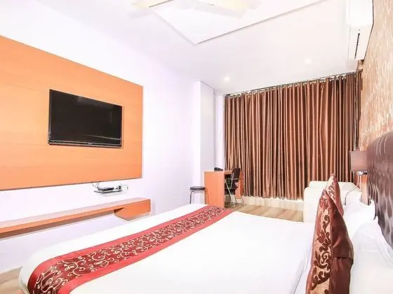 Deluxe Tek Büyük veya İki Ayrı Yataklı Oda