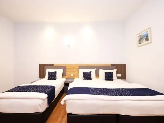 Deluxe Üç Kişilik Oda
