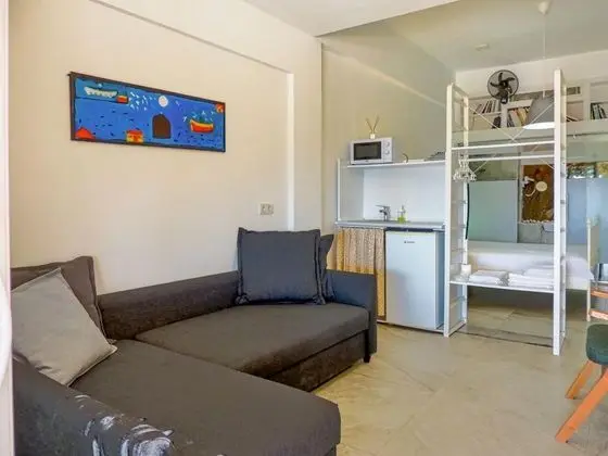 Deluxe Aile Suiti, Deniz veya Bahçe Manzaralı, Verandalı