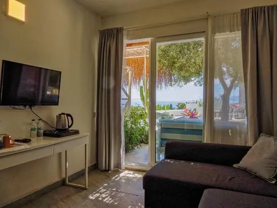 Deluxe Aile Suiti, Deniz veya Bahçe Manzaralı, Verandalı