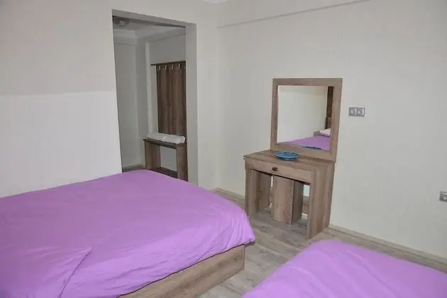 Üç Kişilik Oda