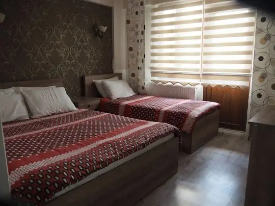 Üç Kişilik Oda