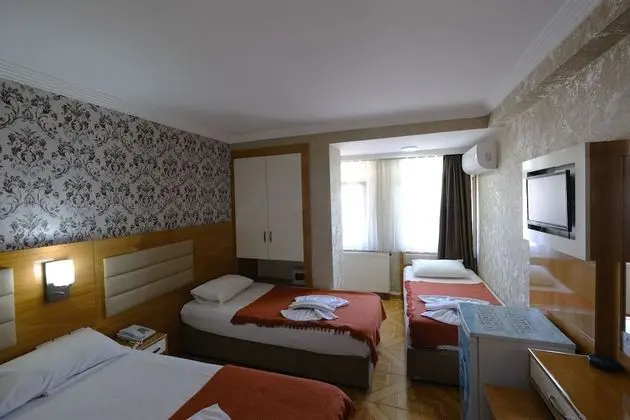 Üç Kişilik Oda