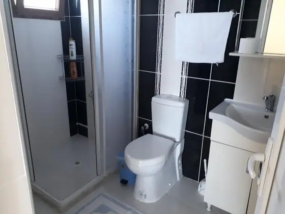 Daire-Zemin Kat, Bahçe Manzaralı, Balkonlu