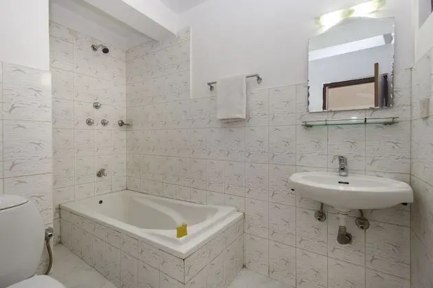 Deluxe Tek Büyük veya İki Ayrı Yataklı Oda, Balkon