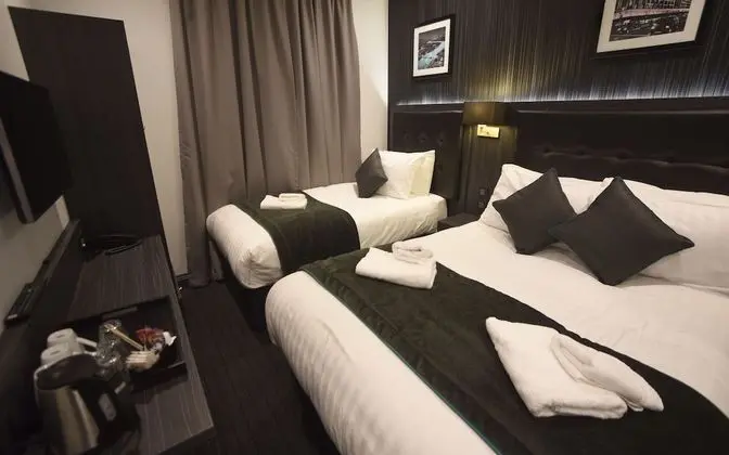 Deluxe Üç Kişilik Oda