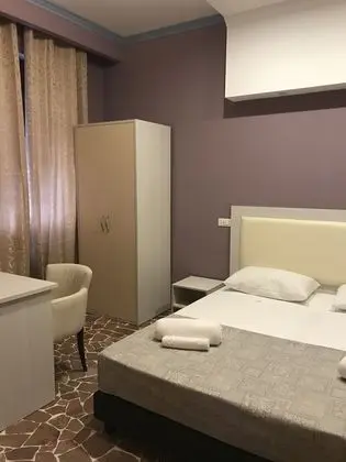 Üç Kişilik Oda