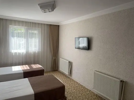 Üç Kişilik Oda, Şehir Manzaralı