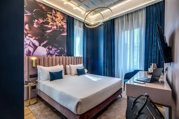 Deluxe Tek Büyük veya İki Ayrı Yataklı Oda