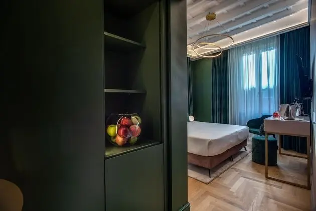 Deluxe Tek Büyük veya İki Ayrı Yataklı Oda