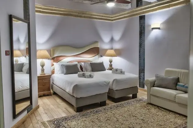 Deluxe Tek Büyük veya İki Ayrı Yataklı Oda